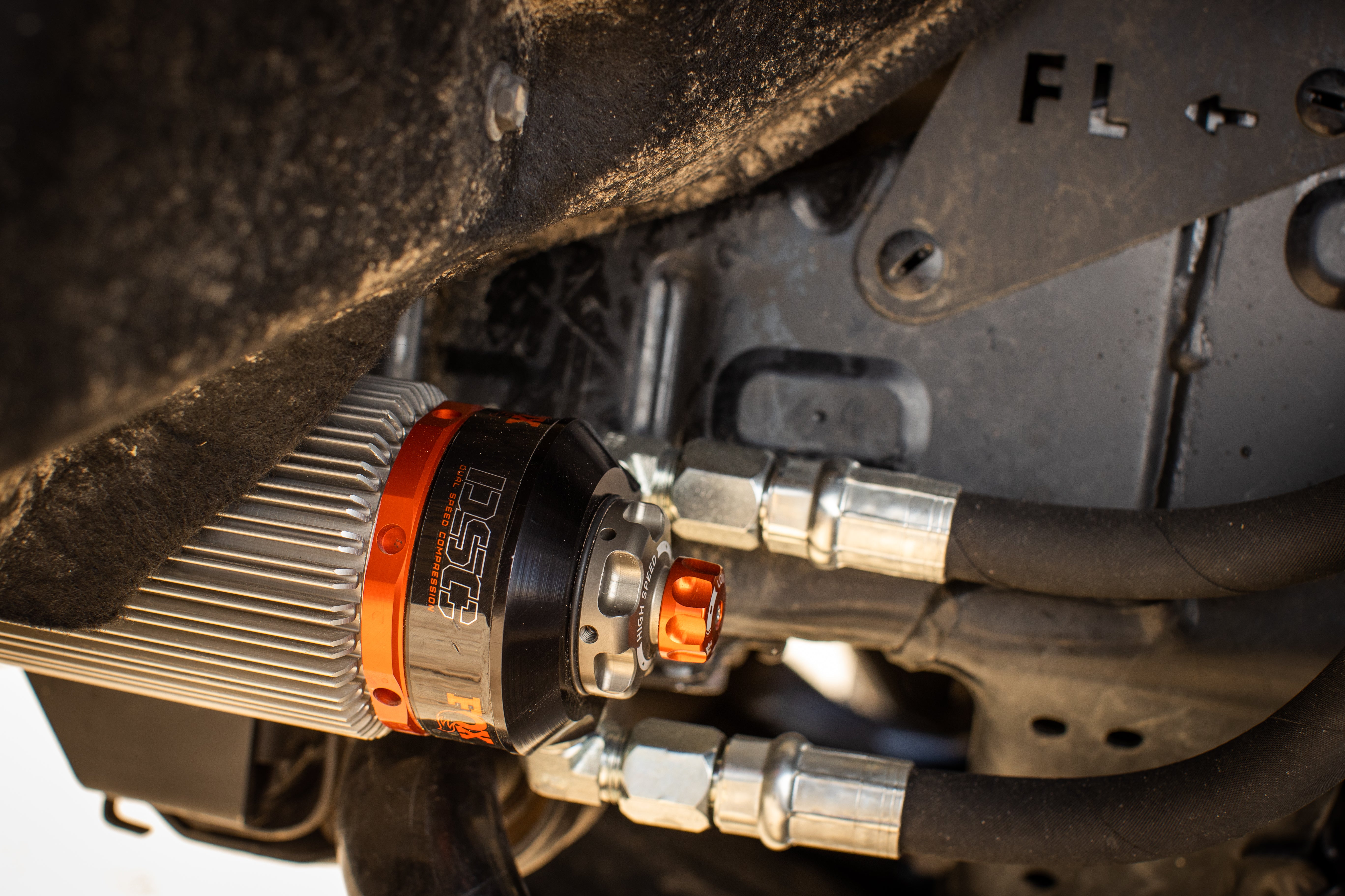 '22-24 Toyota Tundra FOX 3.0 FACTORY RACE RR Coilovers & Rear Shocks (0-1" Lift) w/ Upper Arms & Trailing Arm Combo Kit Close-up Display on Vehicle