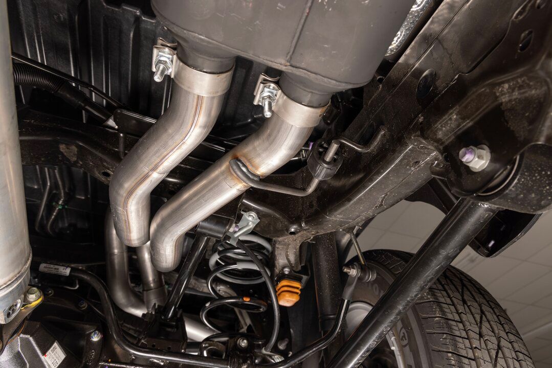 Flowmaster American Thunder Cat-back Exhaust System Close-up Display on Vehicle