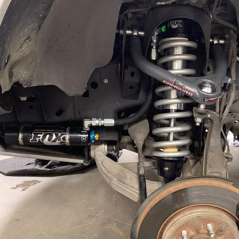 '10-14 Ford Raptor Camburg 1.25" Uniball Upper Control Arms Close-up Display on Vehicle