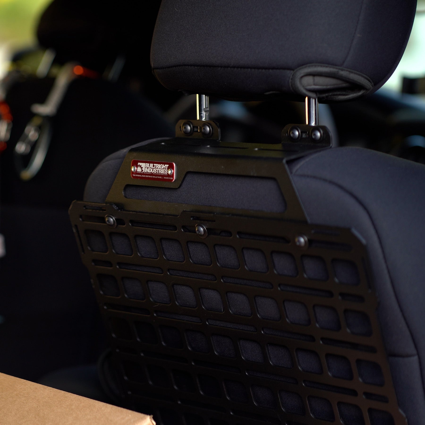 '16-23 Toyota Tacoma Builtright Industries Seat Back Tech Plate Molle Panel Kit Close-up Display in Vehicle