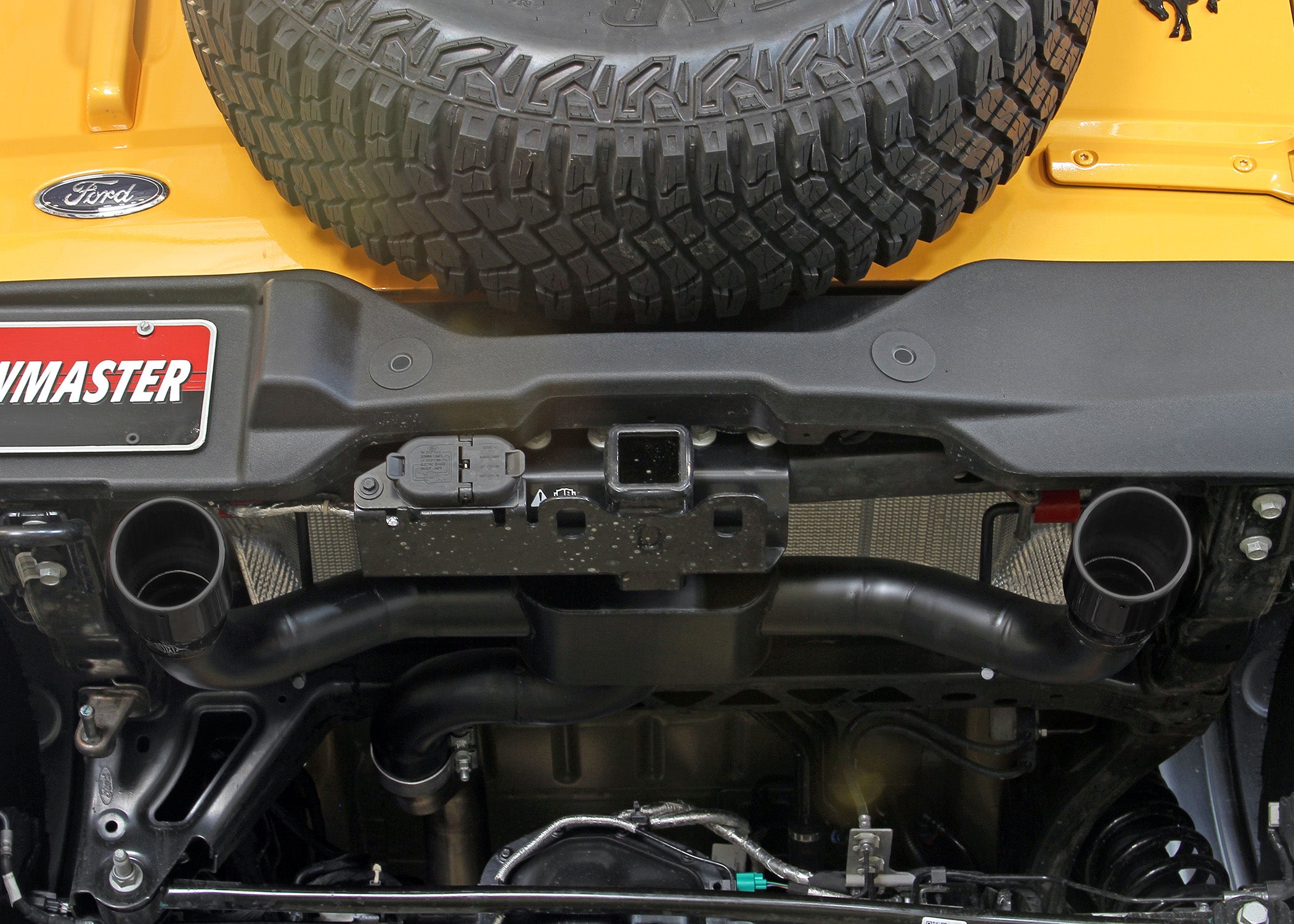 '21-23 Ford Bronco Flowmaster Outlaw Axle-Back Dual Exit Exhaust System Close-up Display on Vehicle