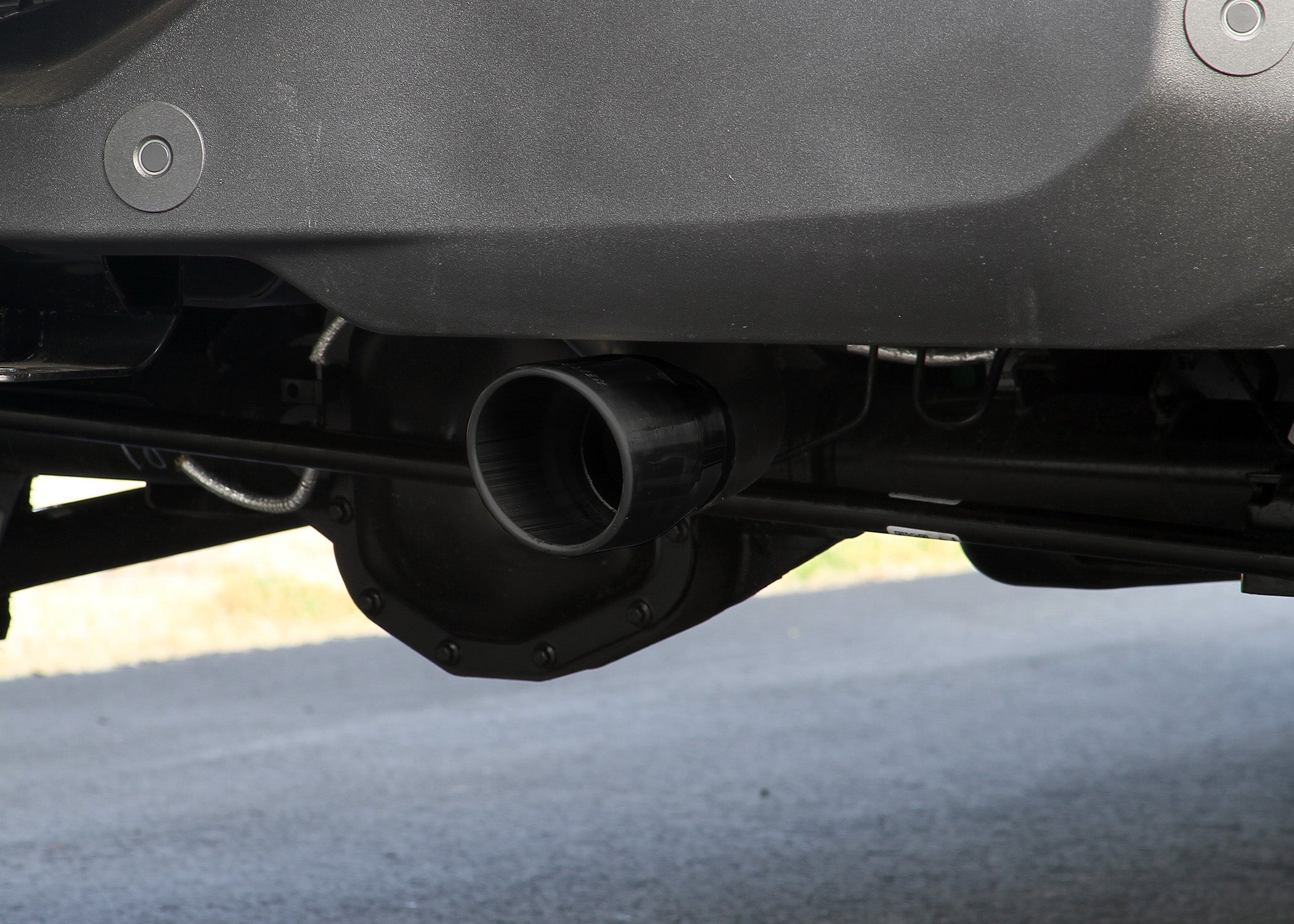 '21-23 Ford Bronco Flowmaster Outlaw Axle-Back Dual Exit Exhaust System Close-up Display on Vehicle