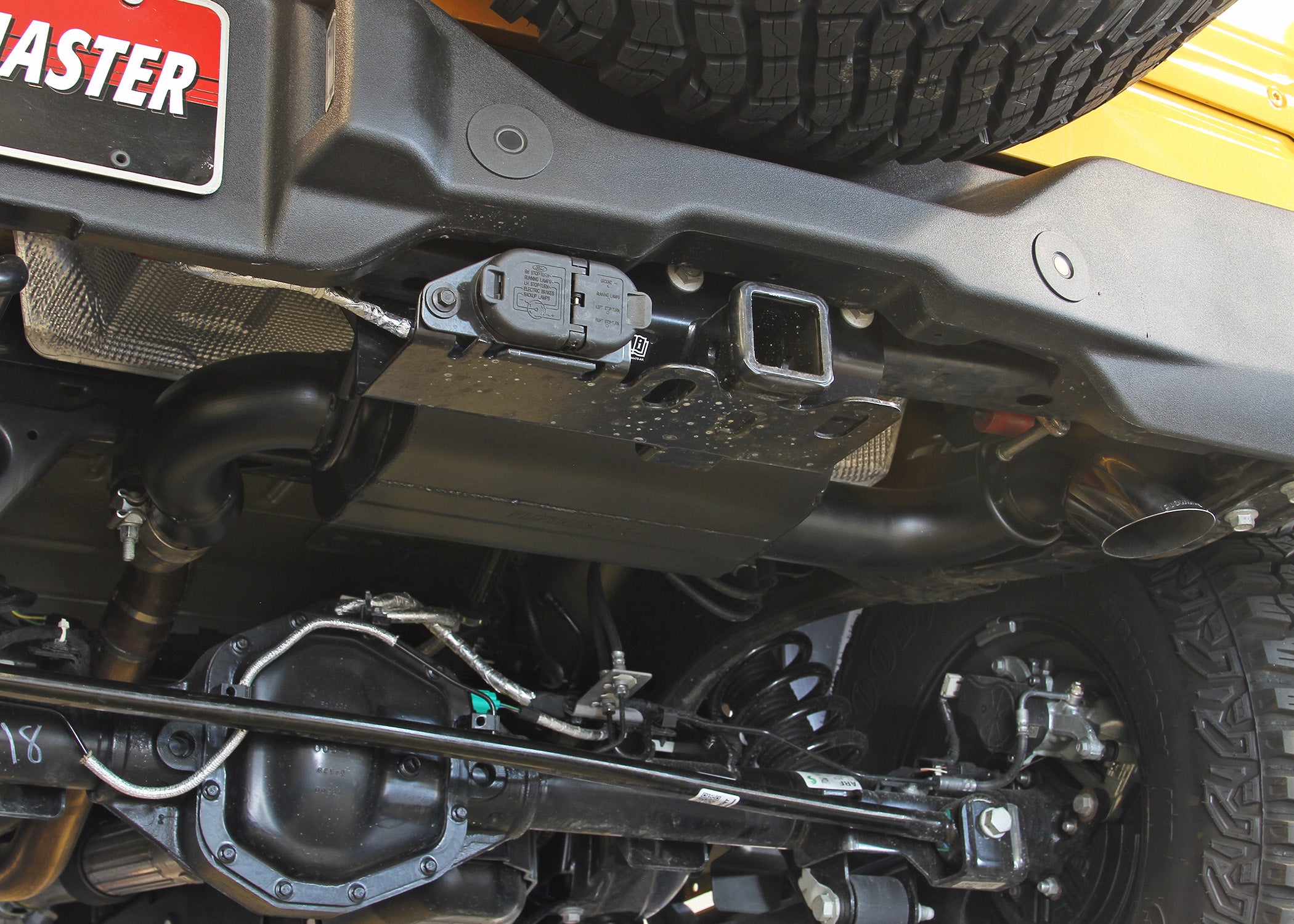 '21-23 Ford Bronco Flowmaster American Thunder Axle-Back Exhaust System Close-up Display on Vehicle