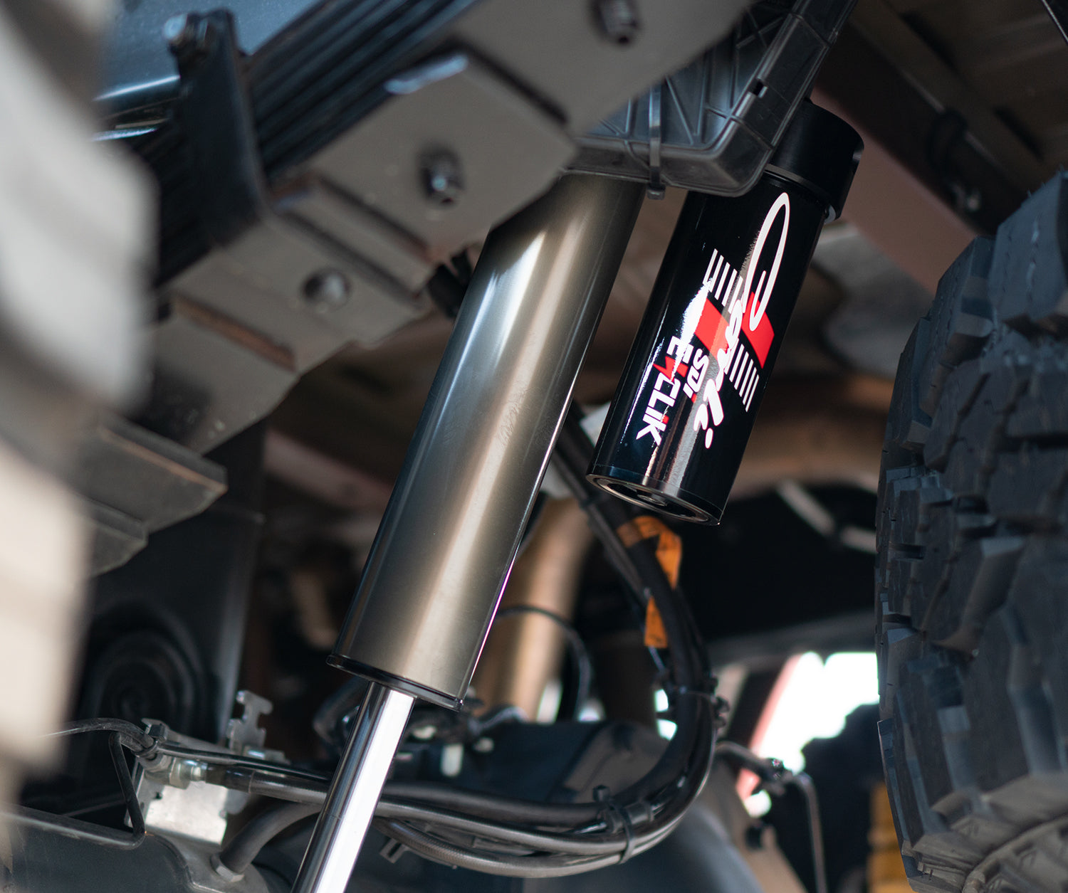 '17-24 Ford F250/350 Carli E-Venture Suspension System-4.5" Lift Close-up Display on Vehicle