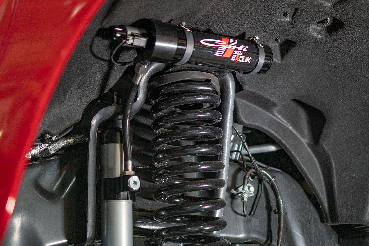 '17-24 Ford F250/350 Carli E-Venture Suspension System-4.5" Lift Close-up Display on vehicle
