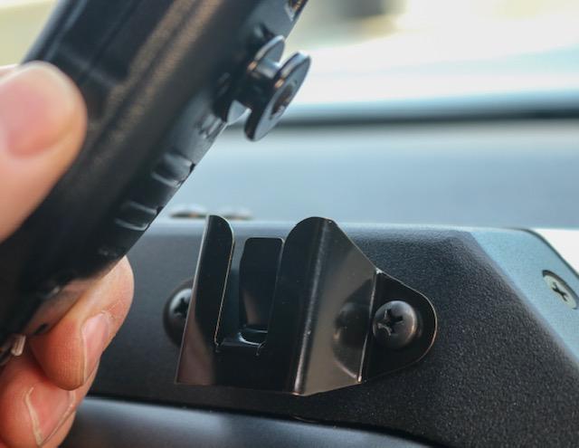 CB Mic and Handheld Radio Holder Close-up Display in vehicle