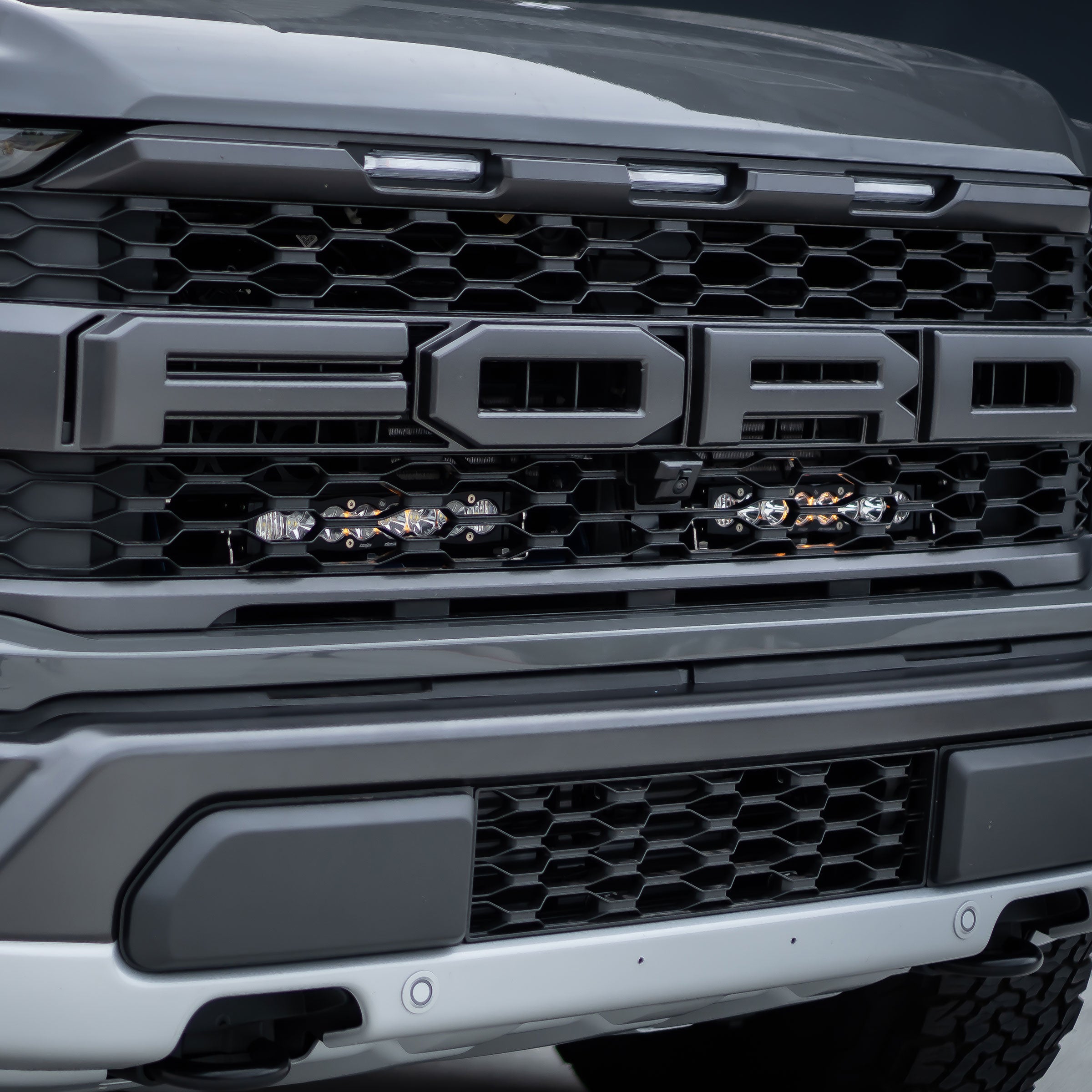 21-22 Ford Raptor Baja Designs S8 Light Bar Behind the Grille Kit display