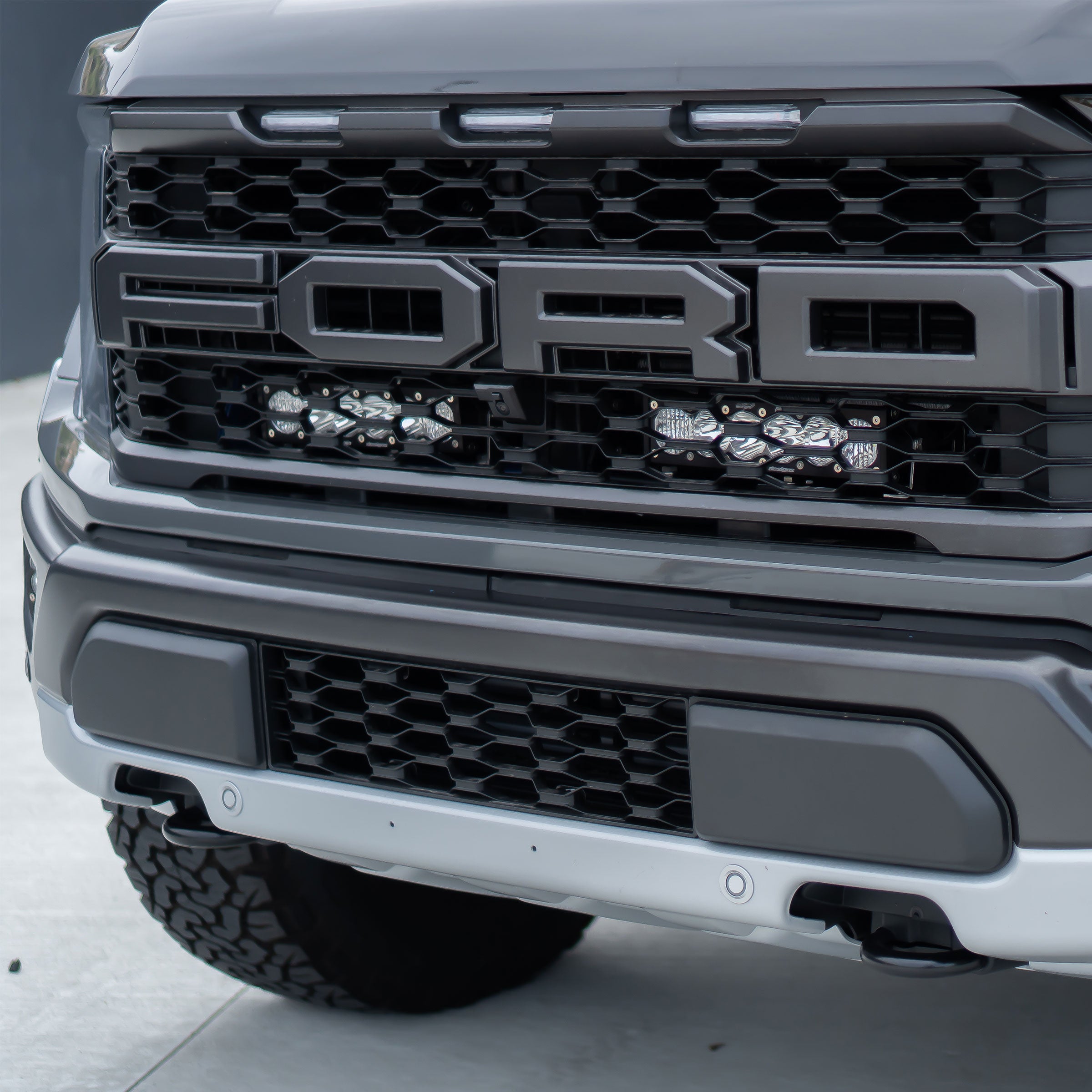 '21-22 Ford Raptor Baja Designs OnX6+ Light Bar Behind the Grille Kit display