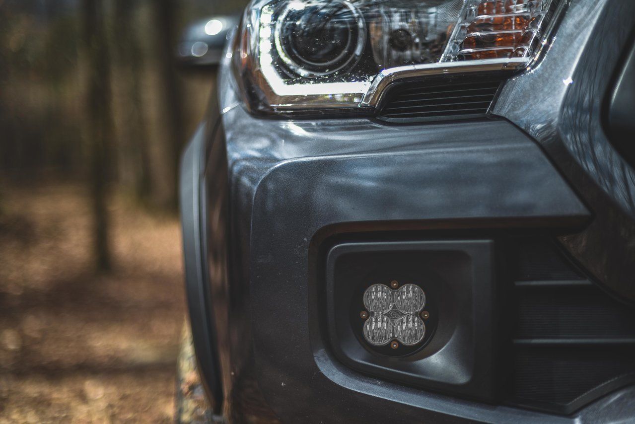 Toyota Tacoma/Tundra/4Runner Squadron Sport (Wide Cornering) Fog Pocket Kit Lighting Baja Designs (front view) Close-up Display on Vehicle