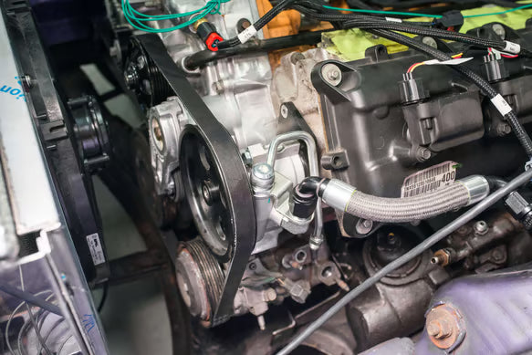 Earl's Remote Reservoir Adapter Kit for Saginaw Type II Power Steering Pumps Front View Silver