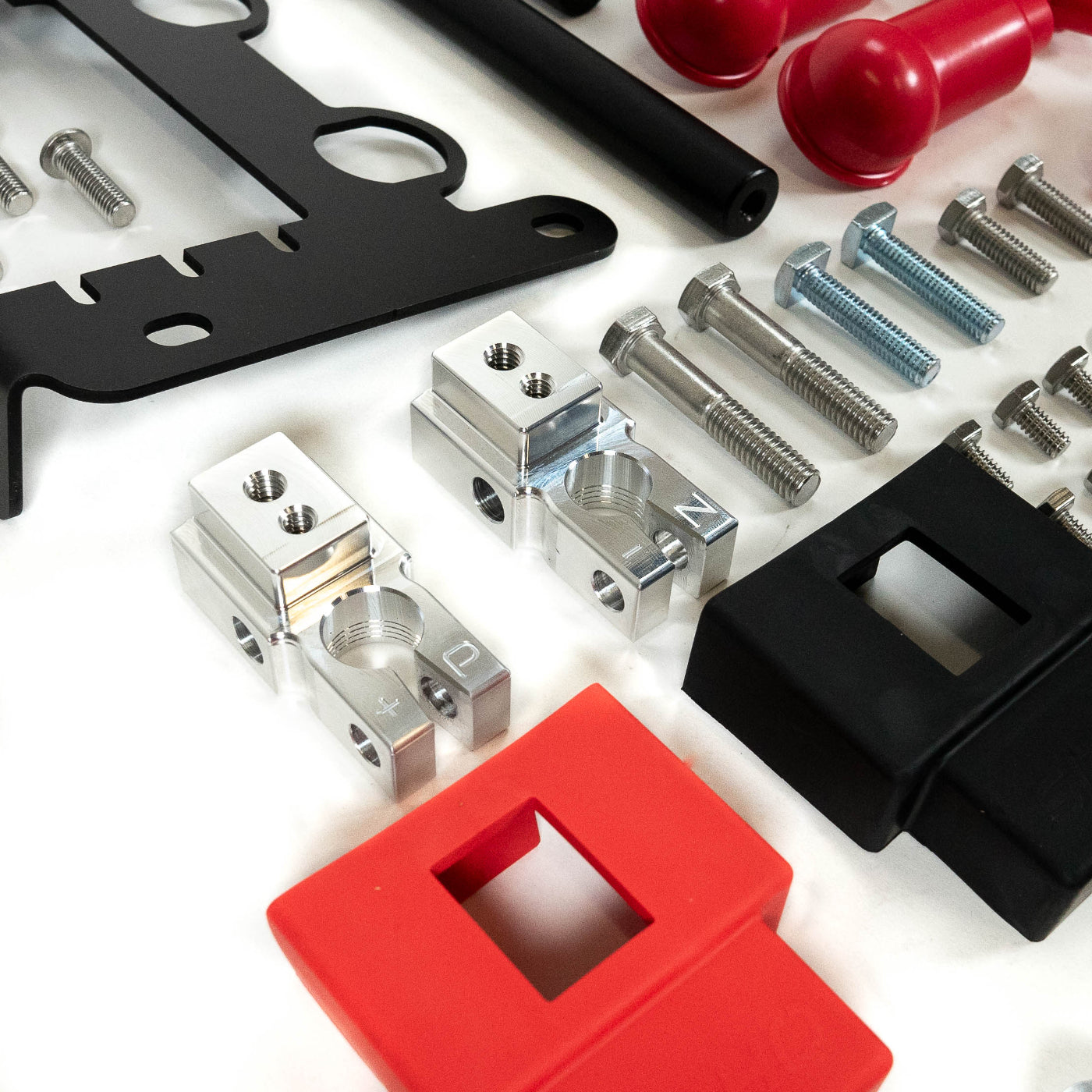 '25+ 4Runner SDHQ Built Under Hood Power Solution Kit display of included parts and hardware - close-up