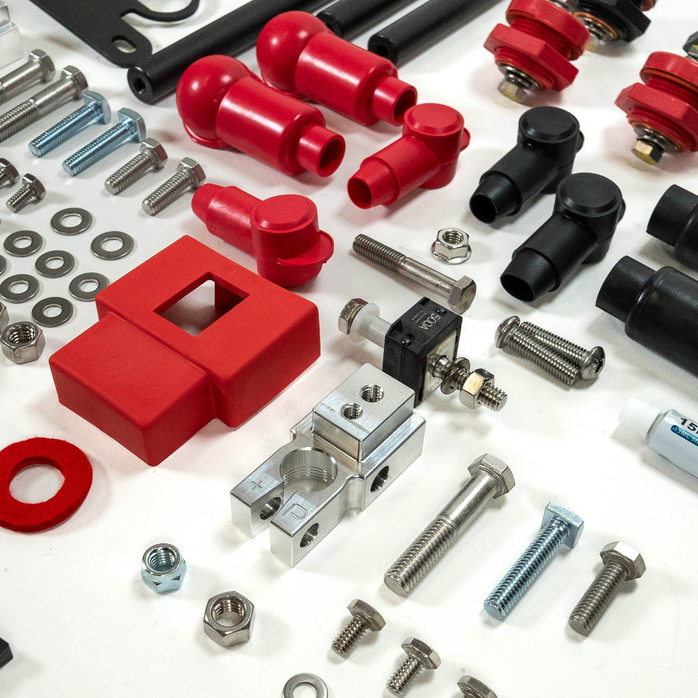 '25+ 4Runner SDHQ Built Under Hood Power Solution Kit display of included parts and hardware - close-up