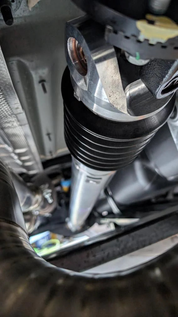 '21-24 Ram TRX Upgraded Aluminum Driveshaft - 1410 Series 1500+HP Close-up Display on vehicle