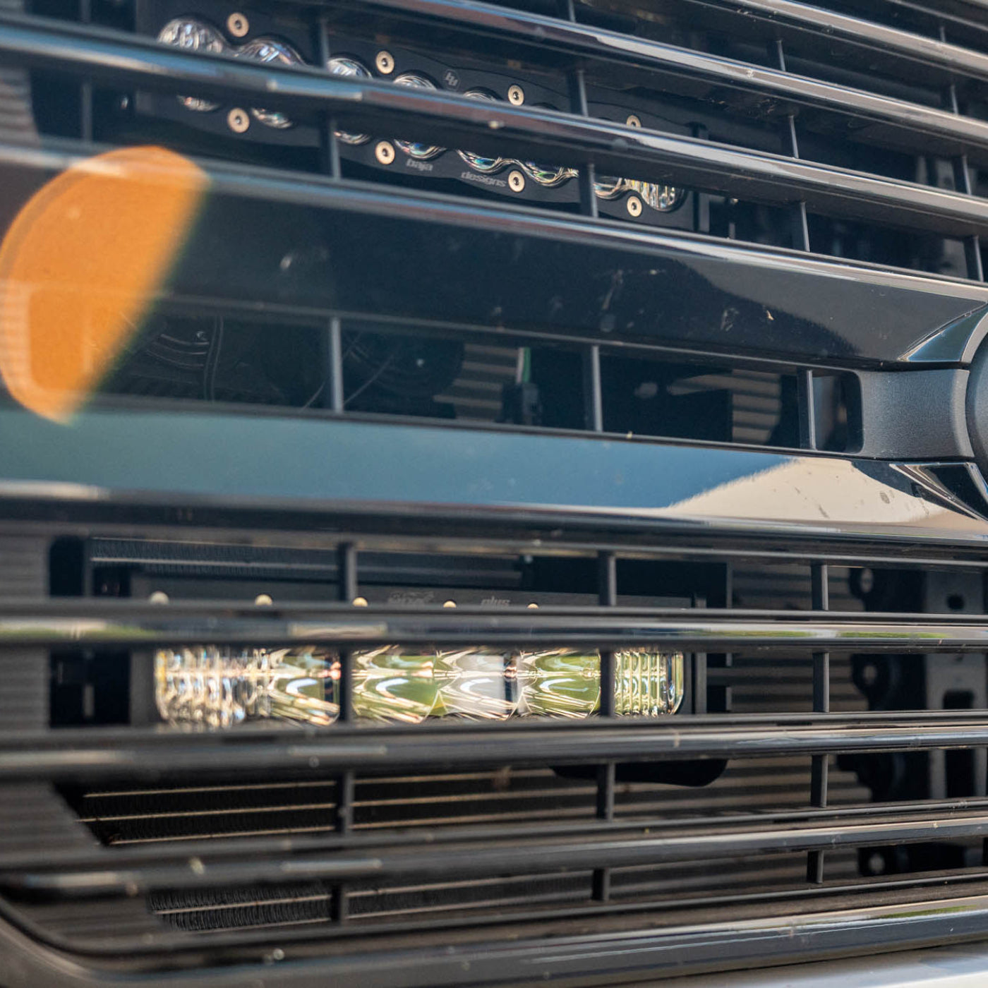 SDHQ Built '21-25 F150 / Raptor Behind the Grille Light Mounting Kit installed close-up