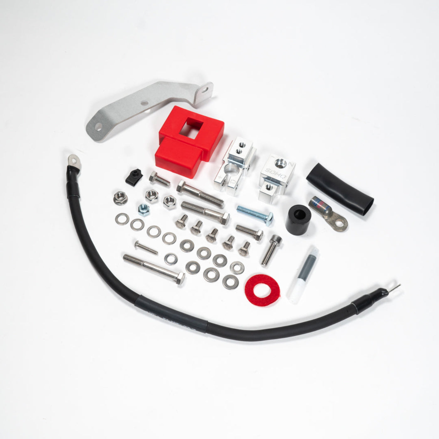 2015-2025 Ford F150/Raptor Complete Billet Battery Terminal Kit display of included parts and hardware 