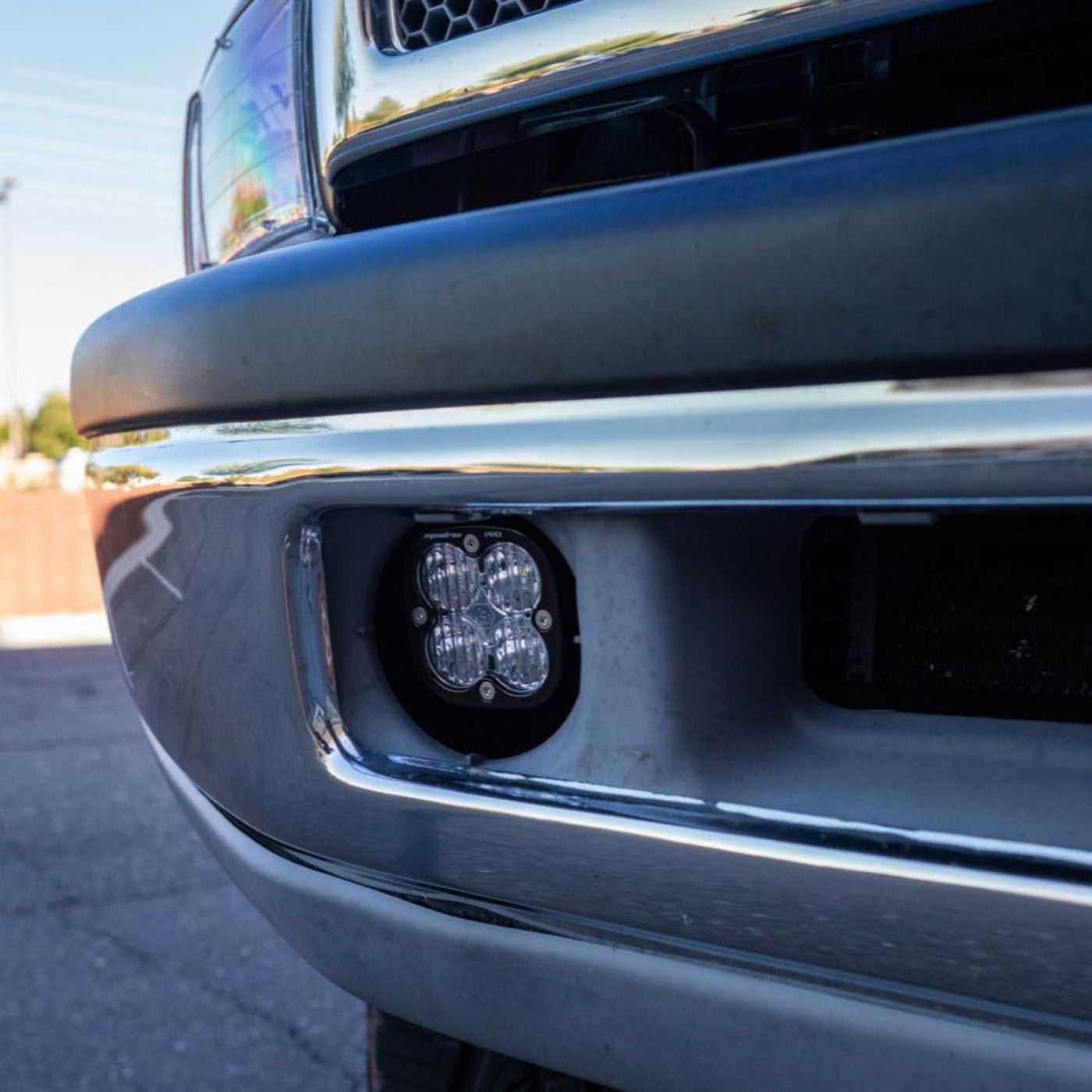 SDHQ Built '94-02 Ram 1500/2500/3500 Fog Light Mounting Kit installed - close-up 