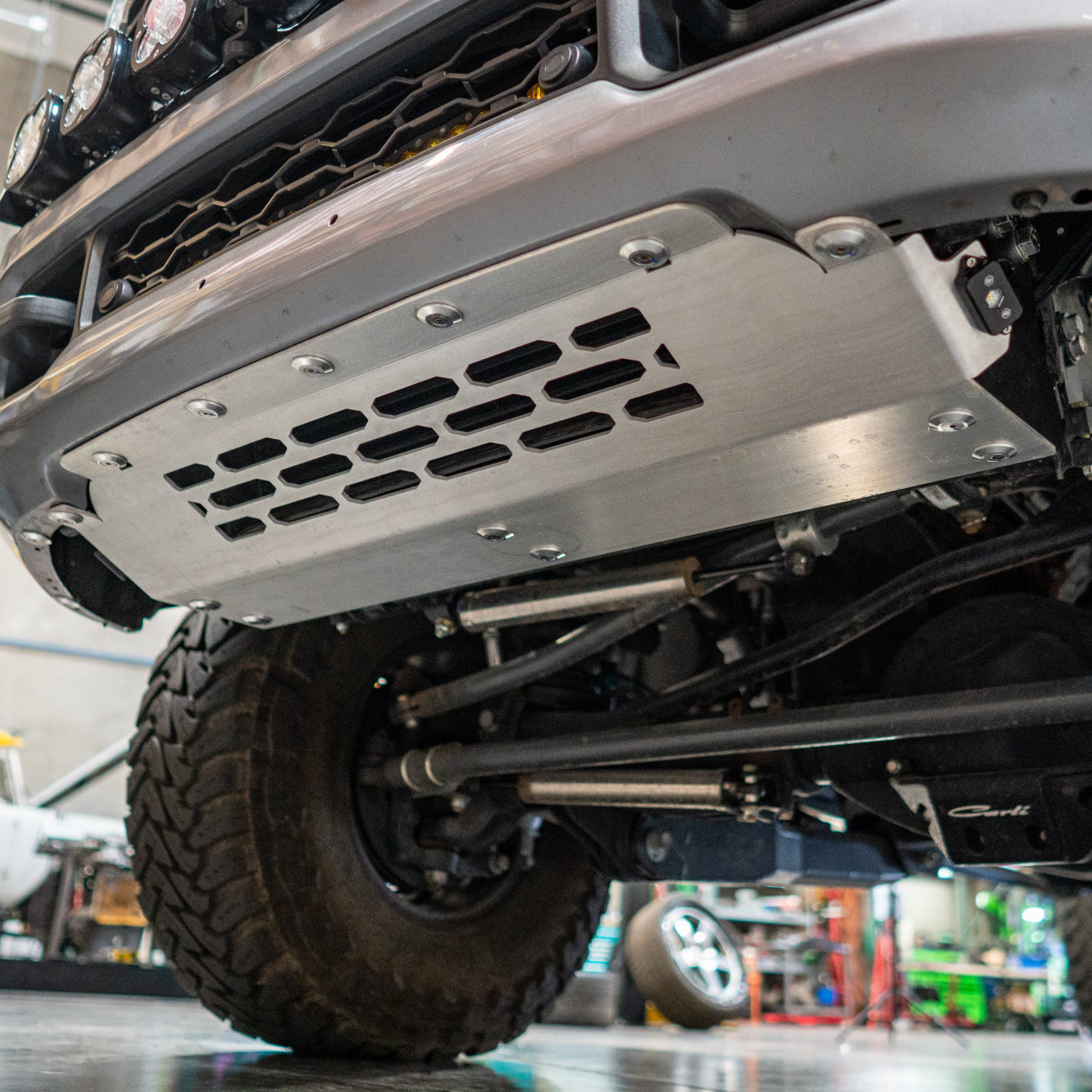 '19-26 Ram 2500/3500 Powerwagon Skid Plate System installed close-up 