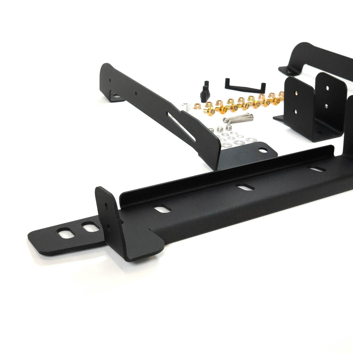 SDHQ Built '24-25 Tacoma Behind The Grille Pod Light Mounting Kit display of included parts and hardware 