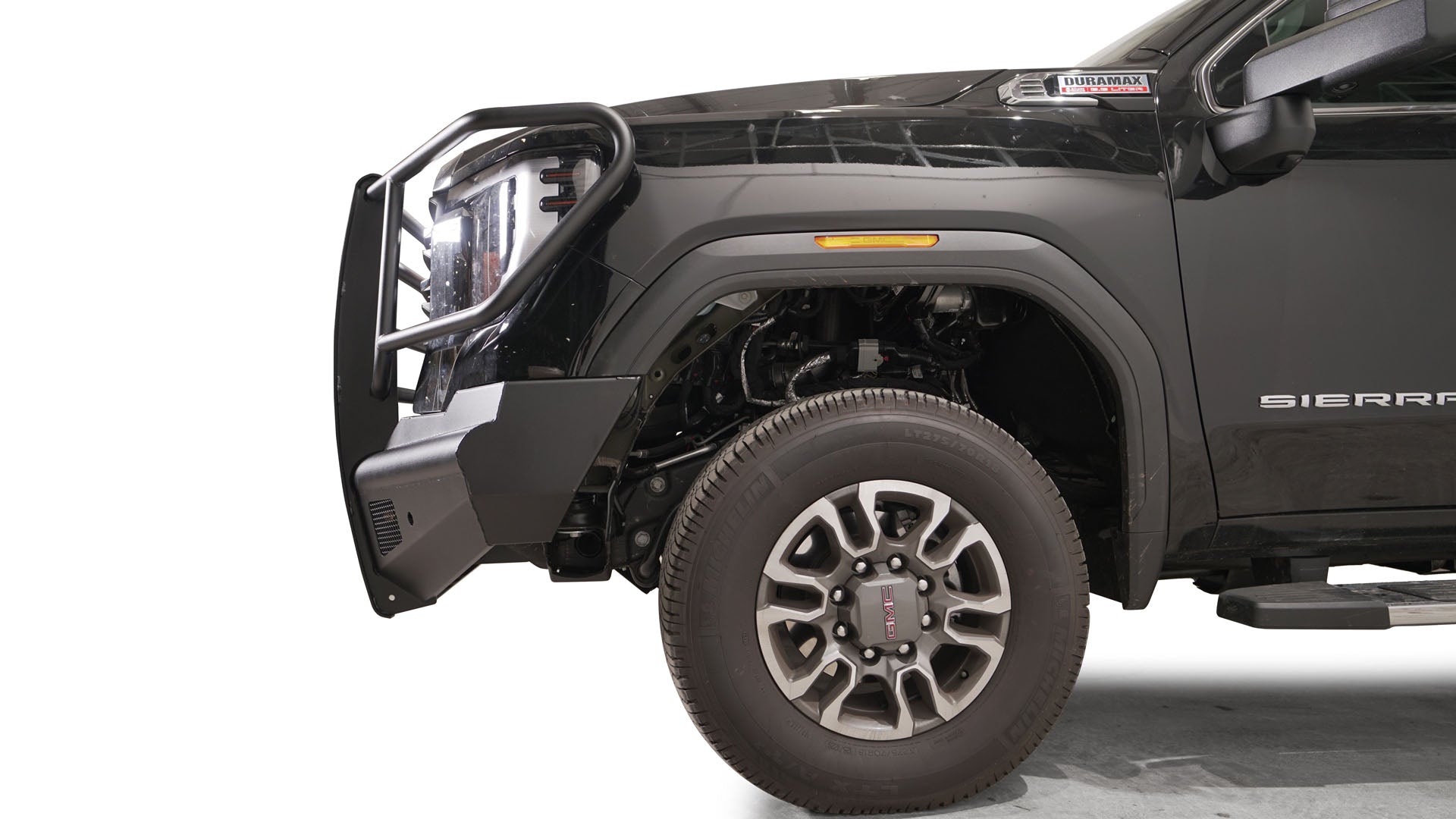 '24+ GMC 2500/3500 Black Steel Elite Front Bumper Display on Vehicle (Side View)