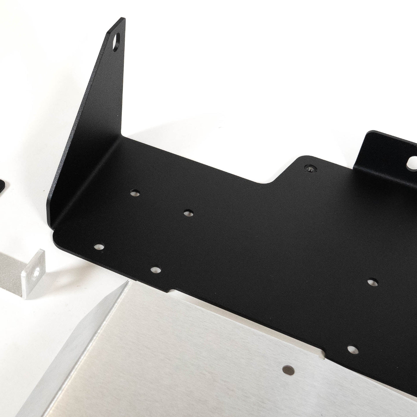 SDHQ Built 2024 LC250 ARB Twin Air Compressor Mount display of included parts and hardware - close-up 