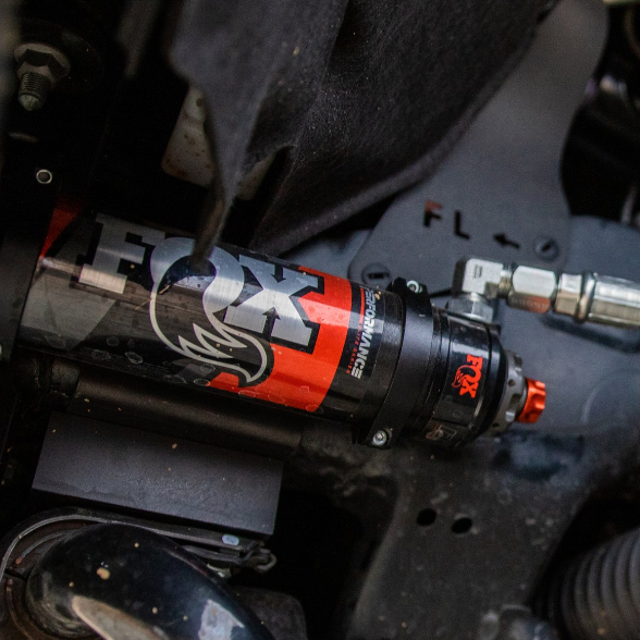 '22-23 Toyota Tundra FOX 2.5 ELITE SERIES RR Coilovers & Rear Shocks (w/ 0-1.5" Rear Lift) w/ Upper Arms & Trailing Arm Combo Kit Close-up Display on Vehicle 