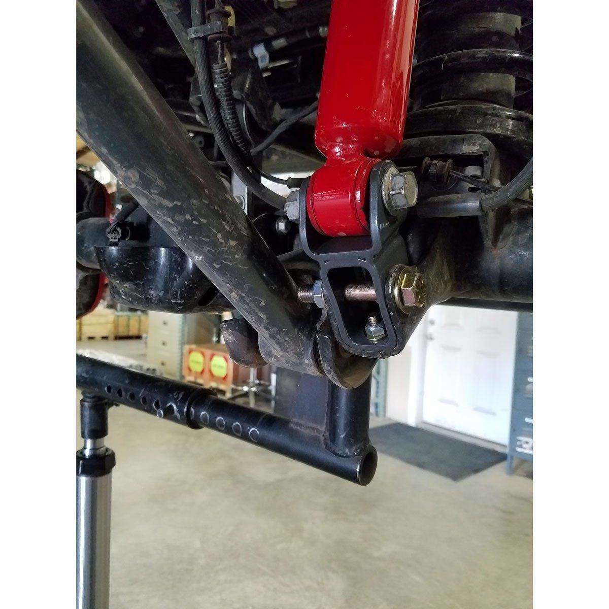 '18-23 Jeep JL Front and Rear Lower Shock Relocation Kit Suspension Synergy Manufacturing close-up