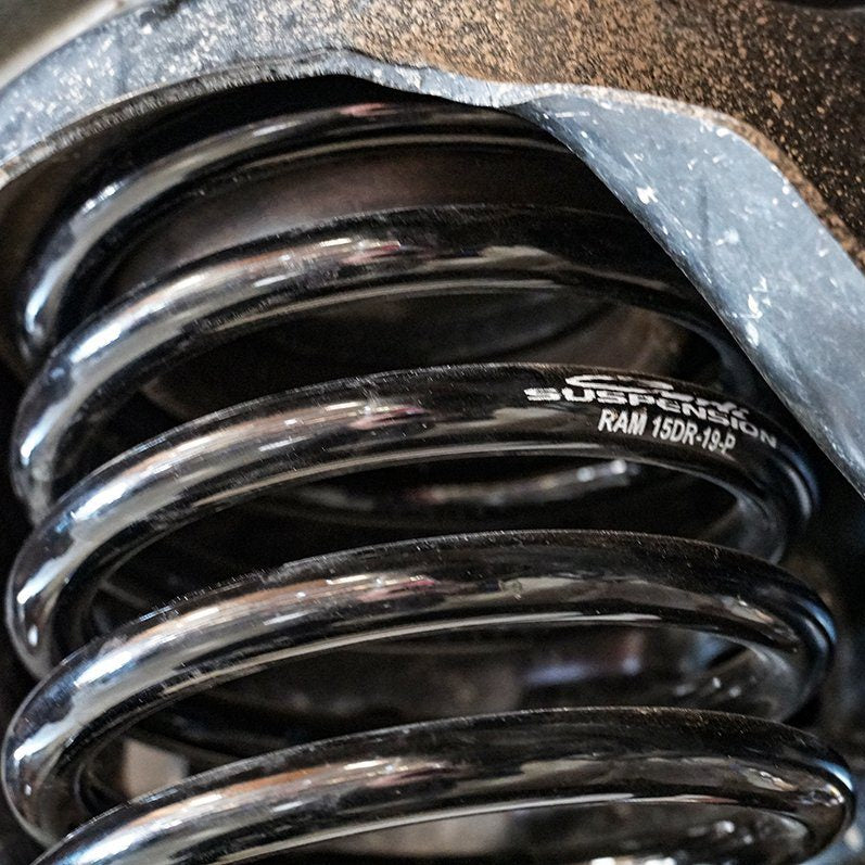 '19-24 Ram 1500 Carli Multi-Rate Rear Coil Springs Close-up Display on vehicle 