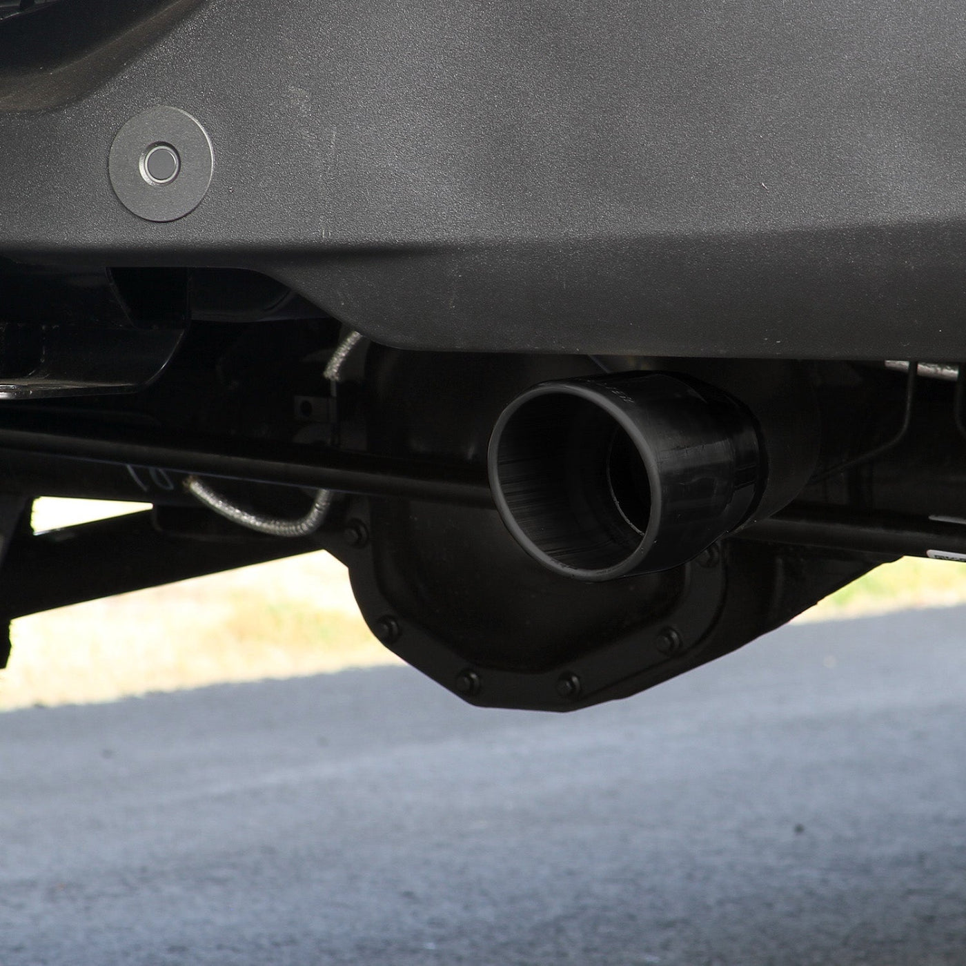 '21-23 Ford Bronco Flowmaster Outlaw Axle-Back Dual Exit Exhaust System Close-up Display on Vehicle 