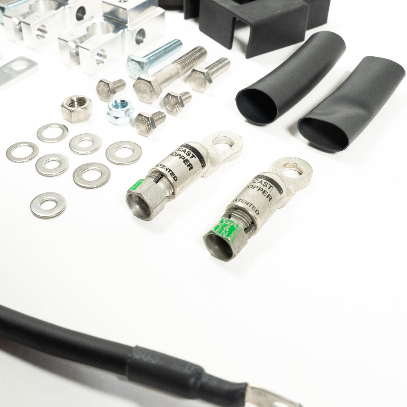 '20-22 Ford F250/350 SDHQ Built Billet Single Battery Terminal Kit display of included parts and hardware 